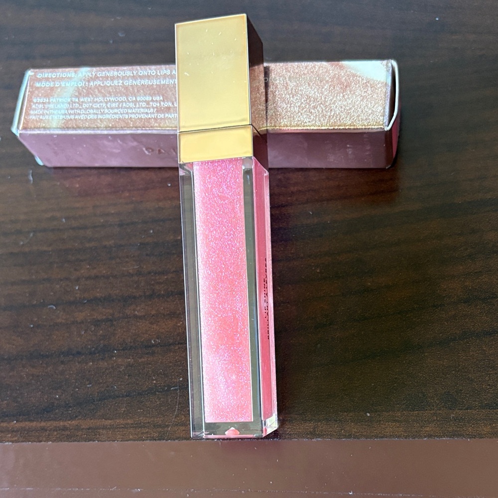 Patrick Ta beautiful gloss NEW with box Color She younger than me?